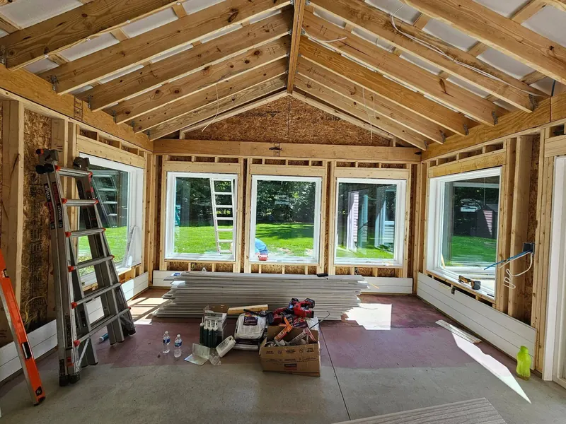 Vaulted addition framed with large new windows